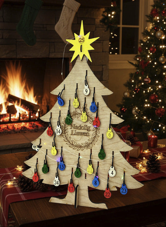 Wooden Christmas tree advent calendar with colorful hanging tags on a light blue background